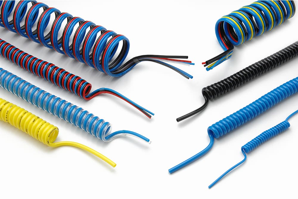 SPIRAL COILED MULTI-TUBE THERMO WELDED